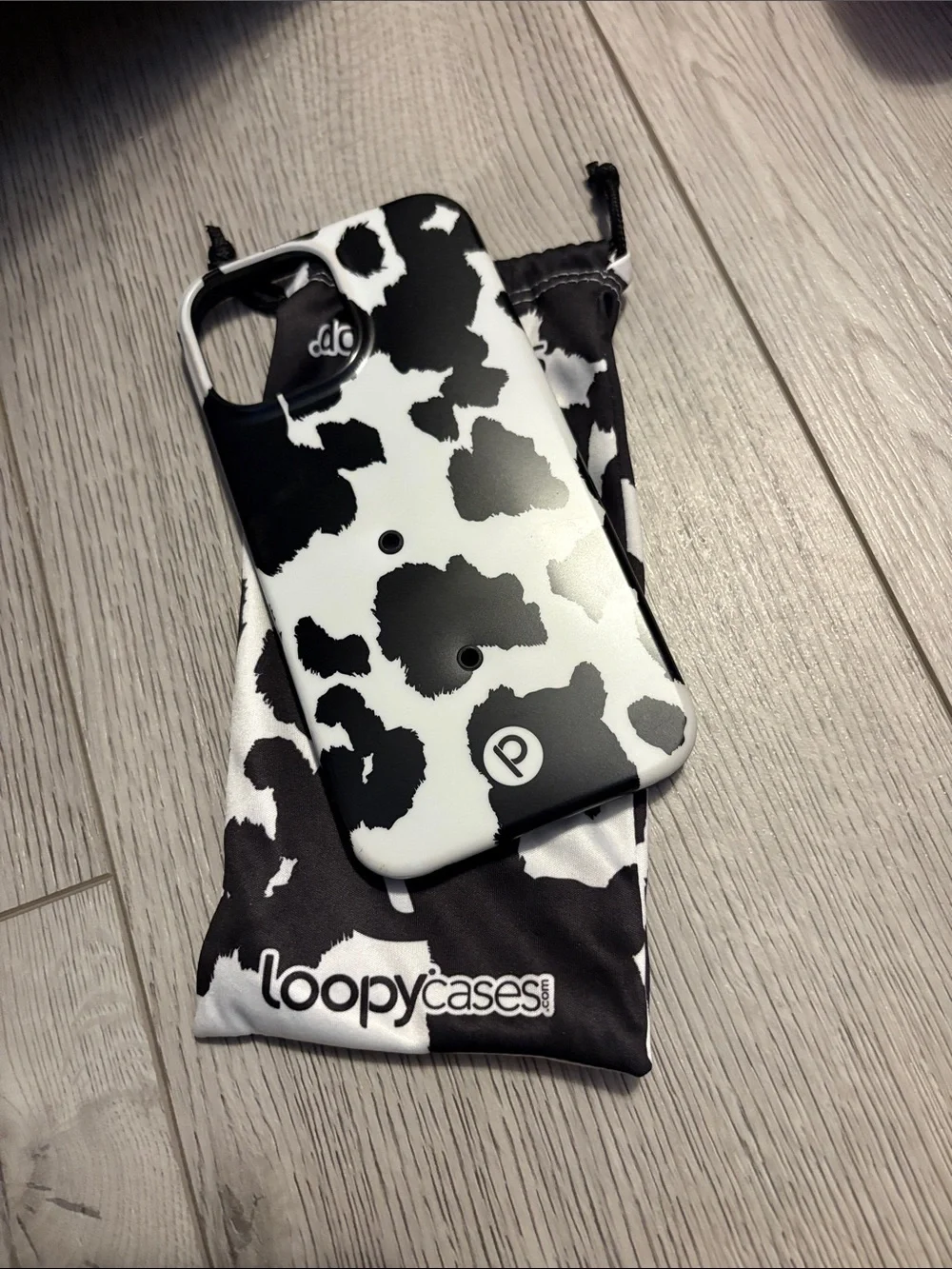 Loopy Case Black & White Cow Print iPhone Case with Integrated Strap